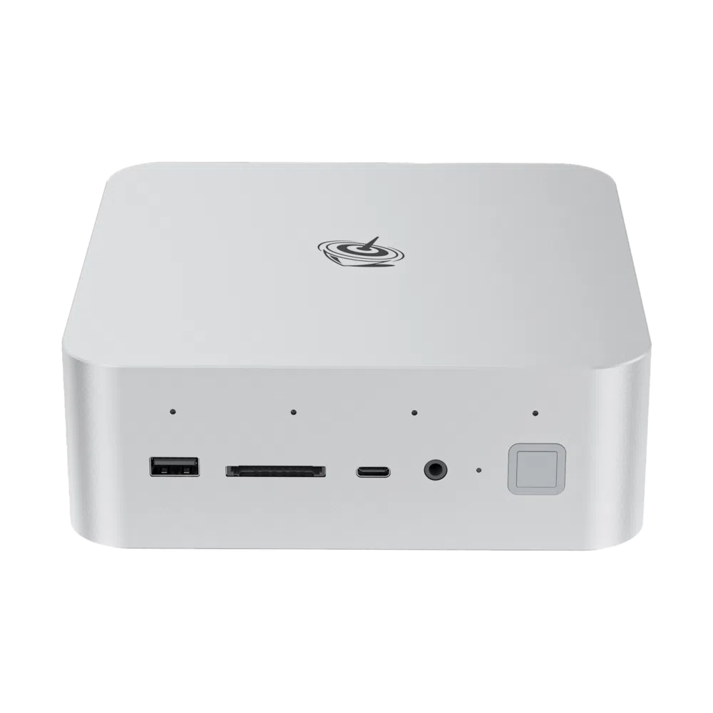 Front view of Beelink GTi14 Ultra mini PC. Silver square device with rounded edges. Visible ports include USB, SD card slot, USB-C, and audio jack. Beelink logo on top. Power button with LED indicator on the right side.