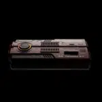 Direct top-down view of the AYANEO AG01 against a black background, clearly showing the engraved branding and heat vents.