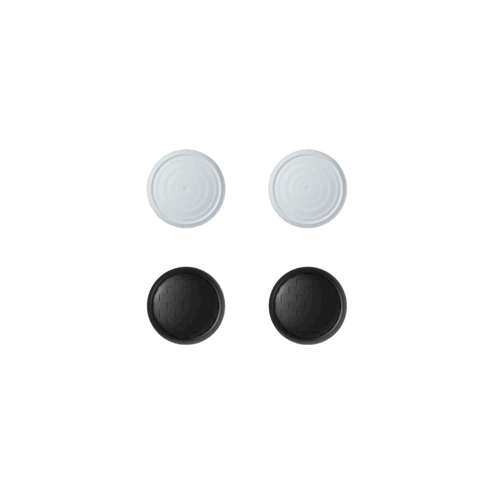 AYANEO joystick caps set in black, designed for AYANEO Pocket Micro and DMG models. The packaging features a pixelated rainbow background with four circular joystick caps visible through a transparent window. The AYANEO logo is displayed at the top left, and the text 'Joystick Cap' along with Chinese characters is printed on the bottom right.