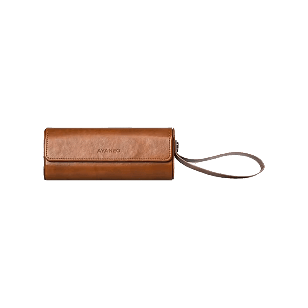 AYANEO Micro Protective Leather Case in brown, featuring a compact, cylindrical design with a fold-over flap secured by a magnetic closure. The case has a wrist strap attached for easy carrying, and the 'AYANEO' logo is embossed on the front. Designed to provide stylish and durable protection for AYANEO Pocket Micro devices.