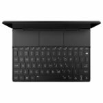 A top-down view of the black GPD WIN MAX 2 handheld gaming PC with its screen flipped back, revealing the full QWERTY keyboard and central touchpad. The game controller elements are hidden beneath covers on either side of the touchpad.
