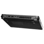An angled view of the back and bottom of the black GPD WIN MAX 2 handheld gaming PC. Various ports are visible along the back edge, including HDMI and USB, along with ventilation grilles. The "L1," "L2" and "R1," "R2" shoulder buttons are also visible on the back corners.