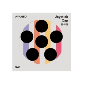 A product image for "AYANEO Joystick Cap" on a light grey background. The center features a circular design with six black circular cutouts, arranged like the pips on a domino, over a background of vertical stripes in purple, orange, and pink. The top left corner displays "AYANEO" in black text, and the top right corner has "Joystick Cap" in English and "摇杆帽" in Chinese, both in black text. A small, stylized "M" logo is present in the bottom left corner.