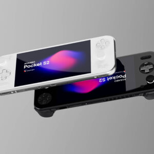 A dynamic overhead shot featuring two AYANEO Pocket S2 handheld gaming consoles, one in white and one in black, diagonally positioned against a dark, reflective surface. Both screens display the "AYANEO Pocket S2" logo with vibrant pink and blue abstract graphics. The white console is in the upper left, while the black console is in the lower right, creating a sense of depth and contrast.