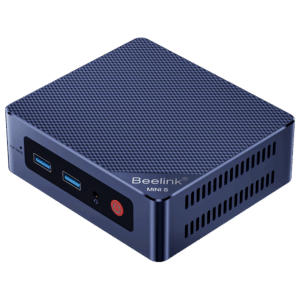 An overhead, angled shot of the dark blue Beelink Mini S12 mini PC against a plain grey background. The top surface features a textured, carbon fiber-like pattern. The front panel, visible on the right, shows two USB-A ports and a red power button. The "Beelink MINI S" logo is visible on the top right side.