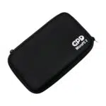 An angled shot of a closed, black hard shell case for the GPD MicroPC 2, isolated against a white background. The top of the case is smooth and features a white "GPD MicroPC 2" logo in the bottom right corner. The case is zipped shut.