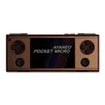 AYANEO-POCKET-MICRO-GOLD-LISTING-01 - DROIX EU A front-on view of an AYANEO Pocket Micro handheld gaming console with a distinctive gold and brown/bronze color scheme, set against a solid dark green background. The console has a horizontal form factor with a central screen displaying the white text "AYANEO POCKET MICRO" over abstract blue and red lines. The controls are a dark brown D-pad and analog stick on the left, and dark brown face buttons and analog stick on the right. The device's trim features a shiny, metallic finis