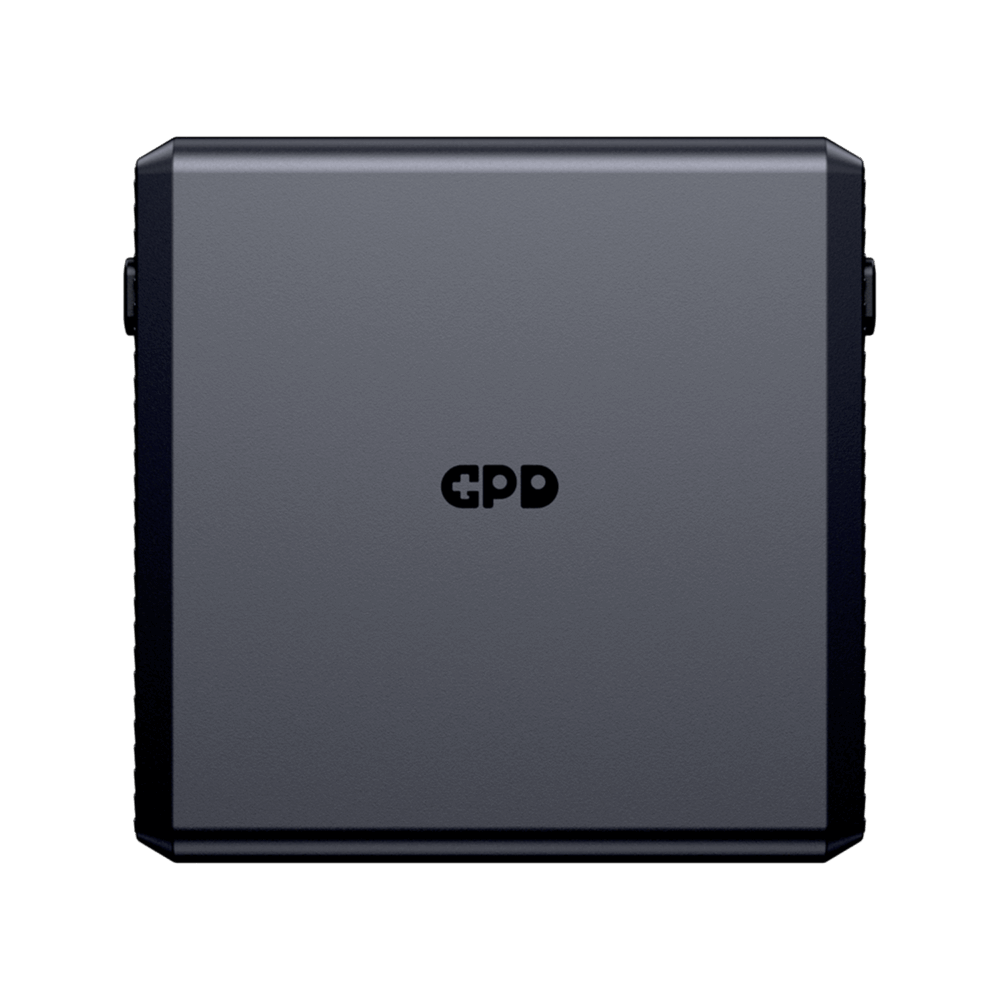 A front view of the black, square, detachable battery pack for the GPD WIN 5, with the GPD logo subtly centered on its surface. The battery is isolated against a black background.