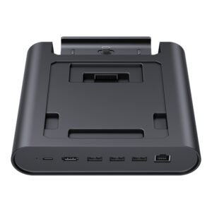 A three-quarter frontal view of a black GPD WIN 5 docking station, isolated against a white background. The dock has a rectangular base with rounded sides. The front edge features several ports: a small indicator light, two USB-C ports, two USB-A ports, and an RJ45 Ethernet port. The top of the dock is recessed to securely hold the device, featuring a connector for power and data.
