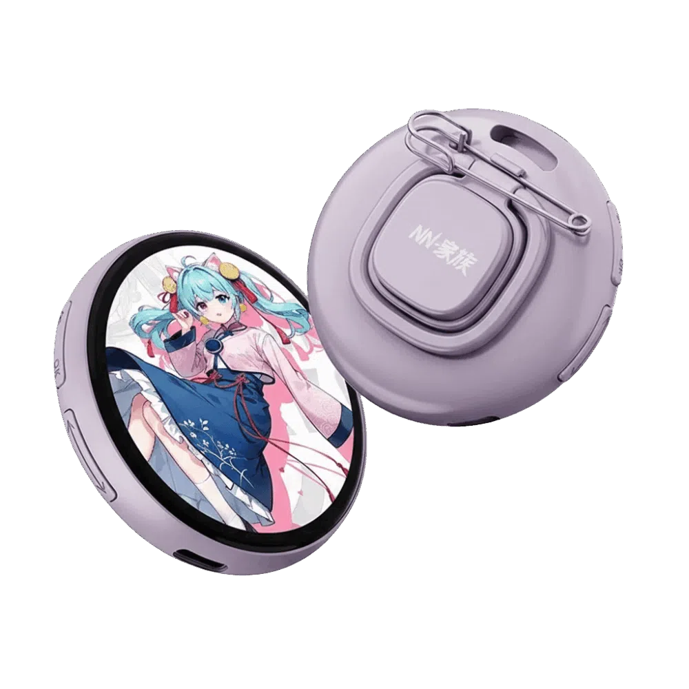 Two circular digital smart badges in a light lavender purple color. The front badge features a round LCD screen displaying an anime-style girl with blue hair in a pink and blue outfit. The rear badge shows the back casing with a safety pin attachment, a lanyard hole, and the text "NN-家族" on a central square button.