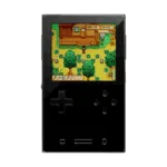 AYANEO-POCKET-VERT-BLACK-LISTING-DONE-01 - DROIX EU A front-facing view of the AYANEO Pocket DMG handheld gaming console in black. It features a vertical orientation with a large square screen displaying a pixel-art farming game. Below the screen is a classic D-pad on the left, four action buttons on the right, and three small navigation buttons at the bottom.