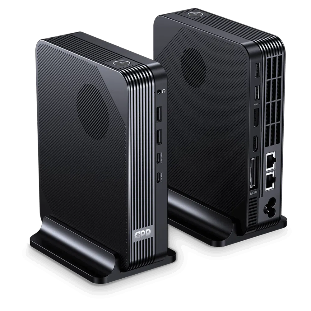 A three-quarter product shot of two identical, black, compact GPD-branded eGPU or docking stations standing in their own bases against a dark background. The unit on the left shows the textured front and a side edge featuring two USB ports and the "GPD" logo. The unit on the right shows the textured back panel, which is densely packed with connectivity ports including Oculink, a power socket, an HDMI port, multiple USB ports, two Ethernet ports, and an audio jack, highlighting its comprehensive input and output capabilities.