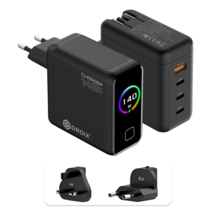 A detailed product graphic showing two views of the black DROIX 140W USB-C Wall Charger and its interchangeable international adapters. The top-left view displays the charger's matte black body with a glossy front screen. The display features a vibrant rainbow-colored circular ring around a "140 W" power indicator. The top-right view highlights the four output ports: three USB-C ports (labeled 40W, 100W, and 140W) and one orange USB-A port (22.5W). At the bottom, two snap-on travel adapters for UK and EU sockets are shown, highlighting the unit’s versatility for global travel.