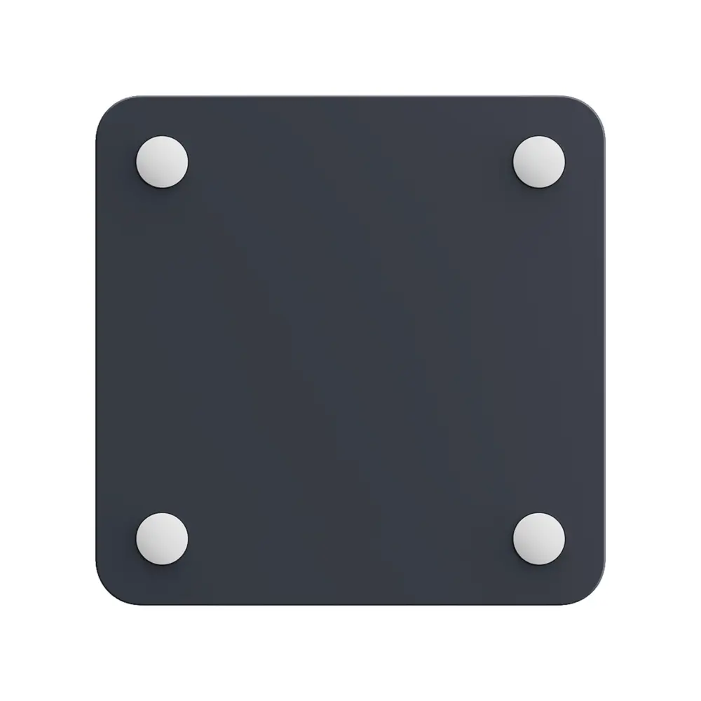 RockTek G2 Next Google TV box underside in matte dark gray, rounded square with four white rubber feet