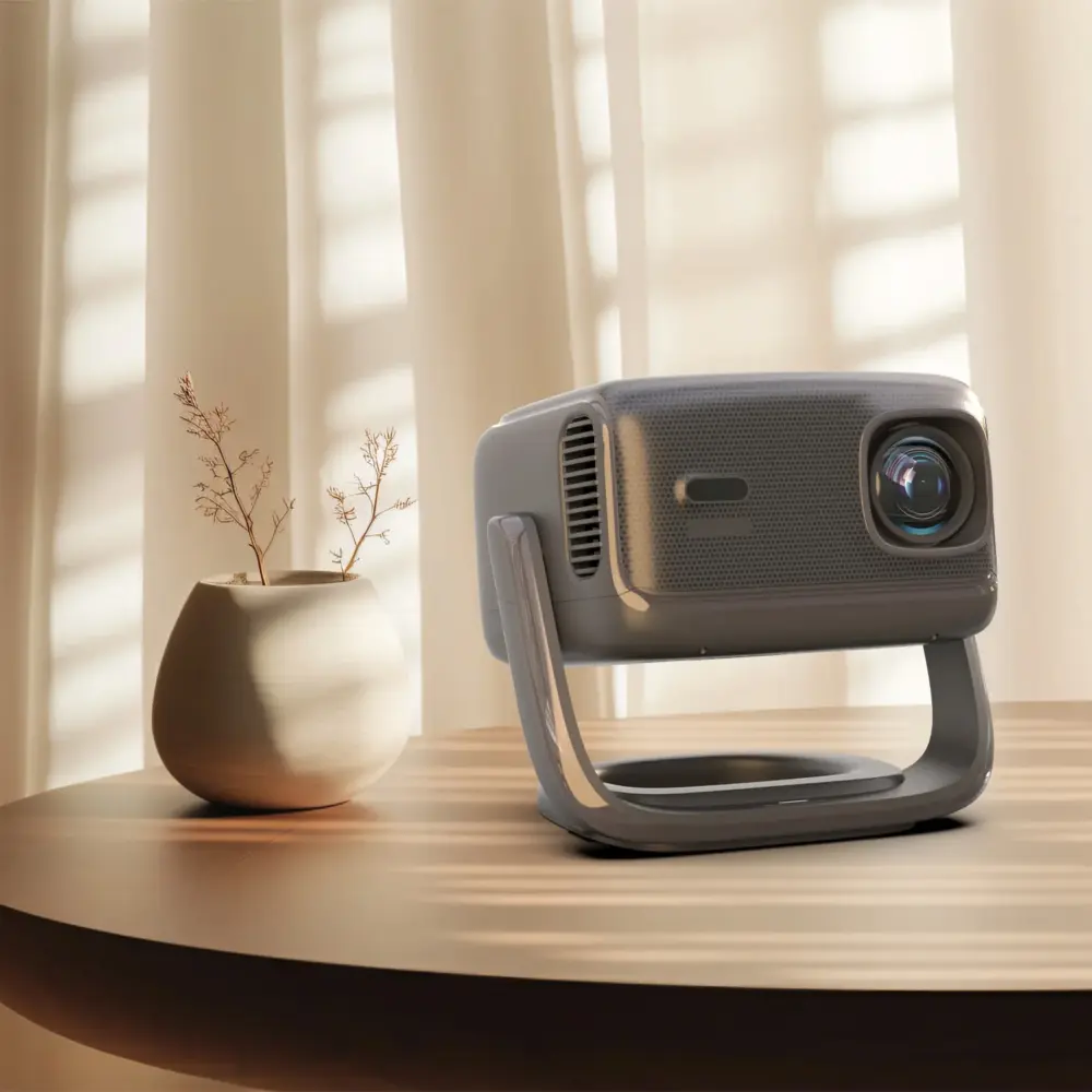 RockTek PJ500 Ultra smart 1080p projector in grey, front angled on stand with textured grille and large lens